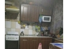 Продается комната с прекрасным видом из окна.